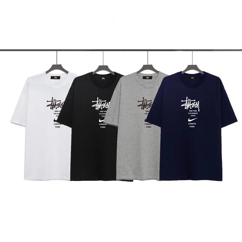 Stussy Nike Graphic T-Shirt in White, Black, Grey, and Navy